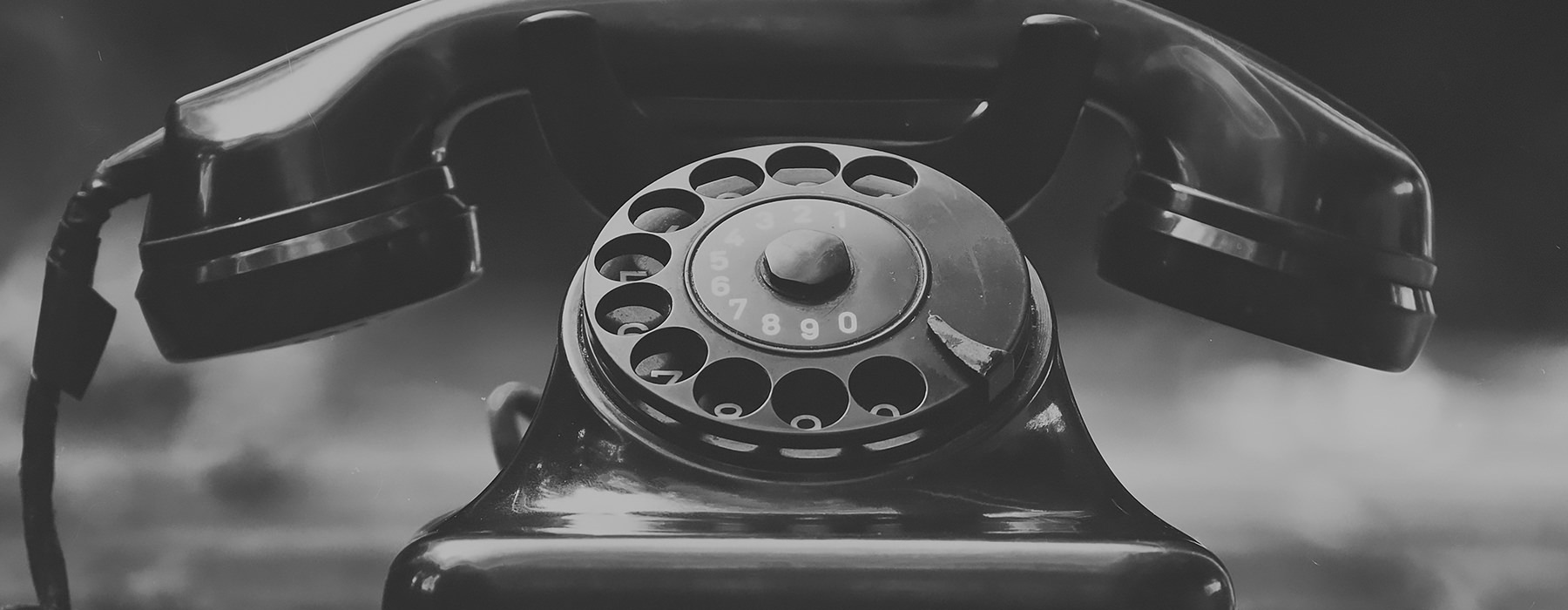 Close up of a black rotary phone